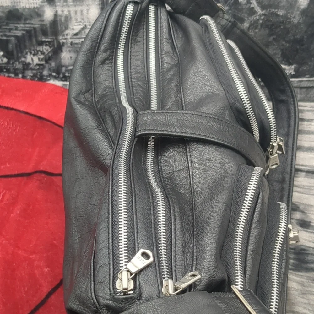 Pele Che Coco Black Leather Bag